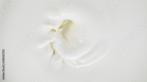 Freeze motion of whirling milk cream  close-up