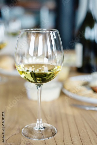 white wine in a glass photo
