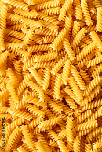 Background of fusilli pasta.