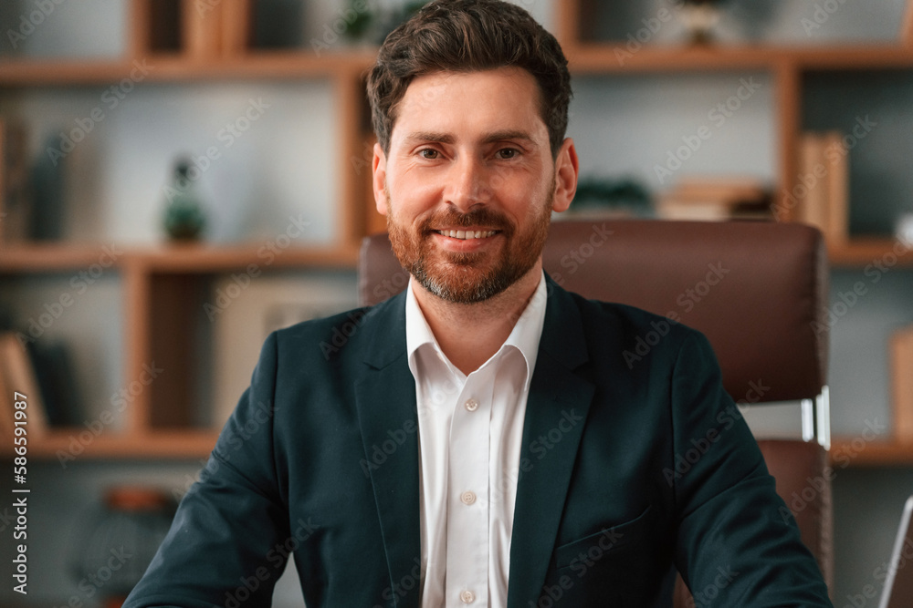 Portrait of businessman in formal clothes that is working indoors Portrait of businessman in formal clothes that is working indoors
