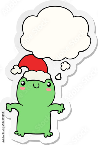 cute cartoon frog wearing christmas hat and thought bubble as a printed sticker