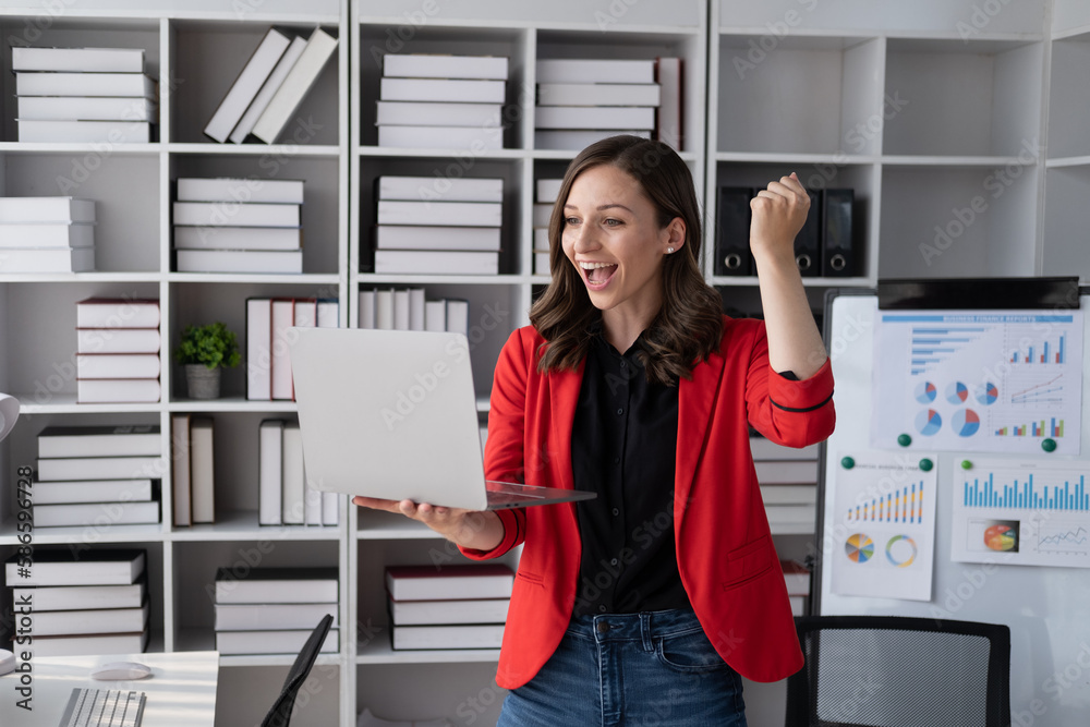 Happy pretty business woman feeling overjoyed and happy after get good news from company.