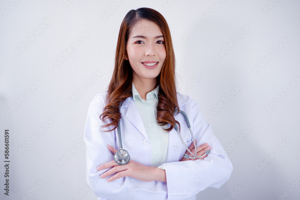Smiling Asian female doctor on white background. Smiling Asian female doctor on white background.