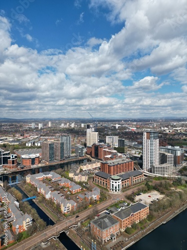 Aerial view of Salford Quays with river views and modern buildings. 