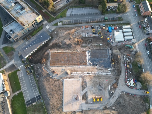 Aerial view of a construction site with large machinery. 