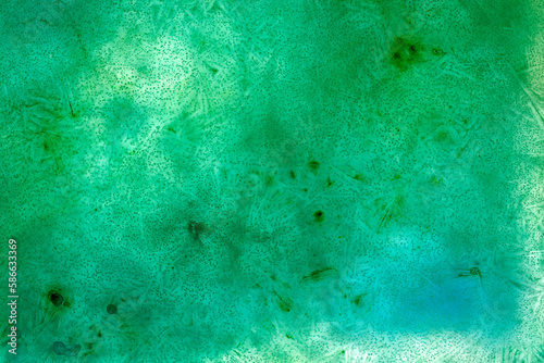 Frozen Ice with colors pigments grunge background texture