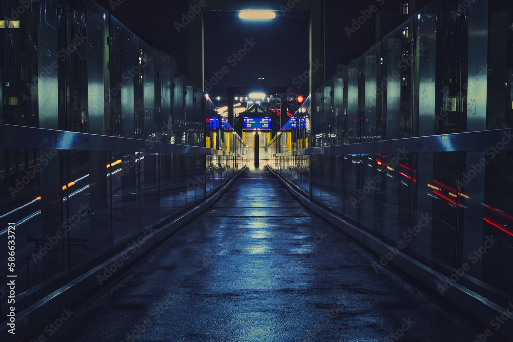 Fototapeta premium Bridge leading to the ETEC metro stop at night in Essen, Germany