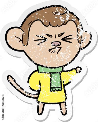 distressed sticker of a cartoon annoyed monkey