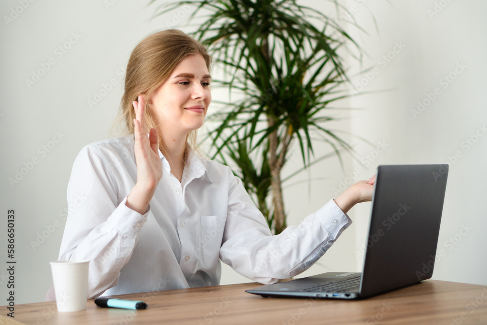 A young girl defends a business project online. Distance learning student. A young girl defends a business project online. Distance learning student.