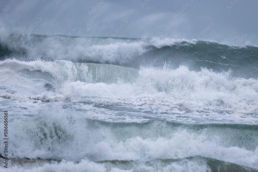 crashing waves off chapel Porth beach cornwall england uk crashing waves off chapel Porth beach cornwall england uk