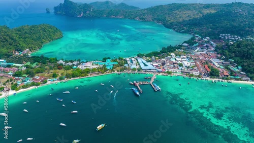 Aerial view of Phi phi island with speedboat sailing on the sea, Thailand. photo