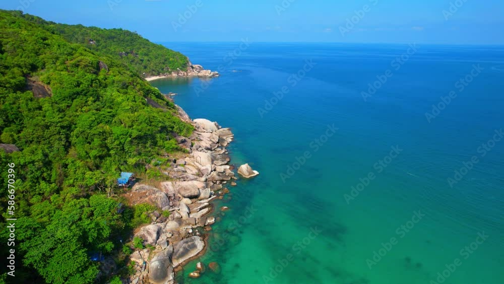 The rocky shores are often lined with small coves and inlets. These areas are characterized by shallow, calm waters that are perfect for exploring the underwater world. (Koh Phangan, Thailand). HDR
