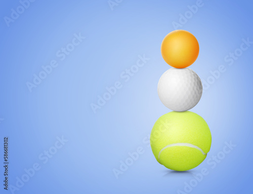 Stack of different sport balls on pale blue background, space for text