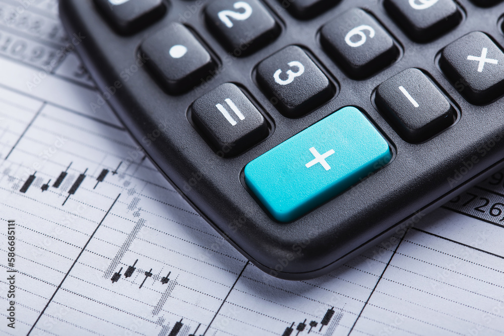 calculator and accounting document. Concept of banking, financial report and financial audit. calculator and accounting document. Concept of banking, financial report and financial audit.