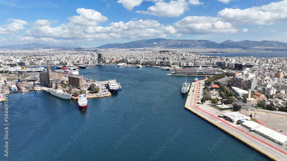 Aerial drone photo from busy port of Piraeus where passenger ships travel to Aegean destination islands, Attica, Greece