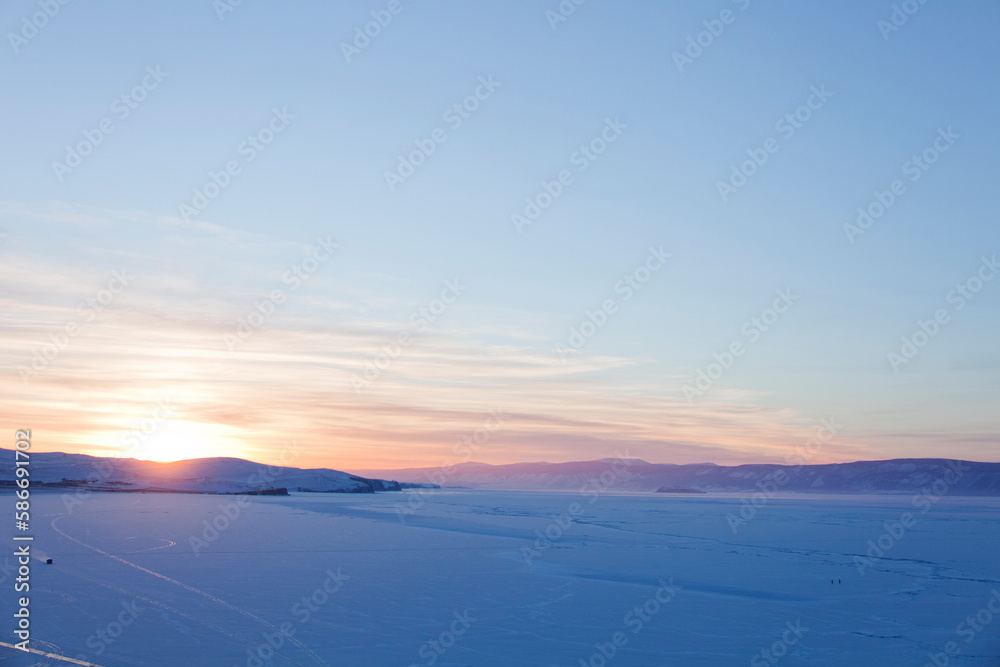 Lake Baikal, winter nature. Sunset landscape