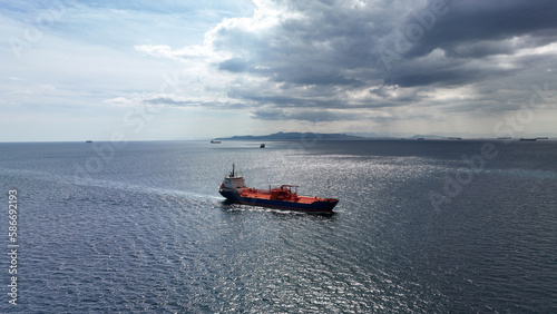 Aerial drone photo of industrial LPG tanker cruising deep blue Mediterranean sea