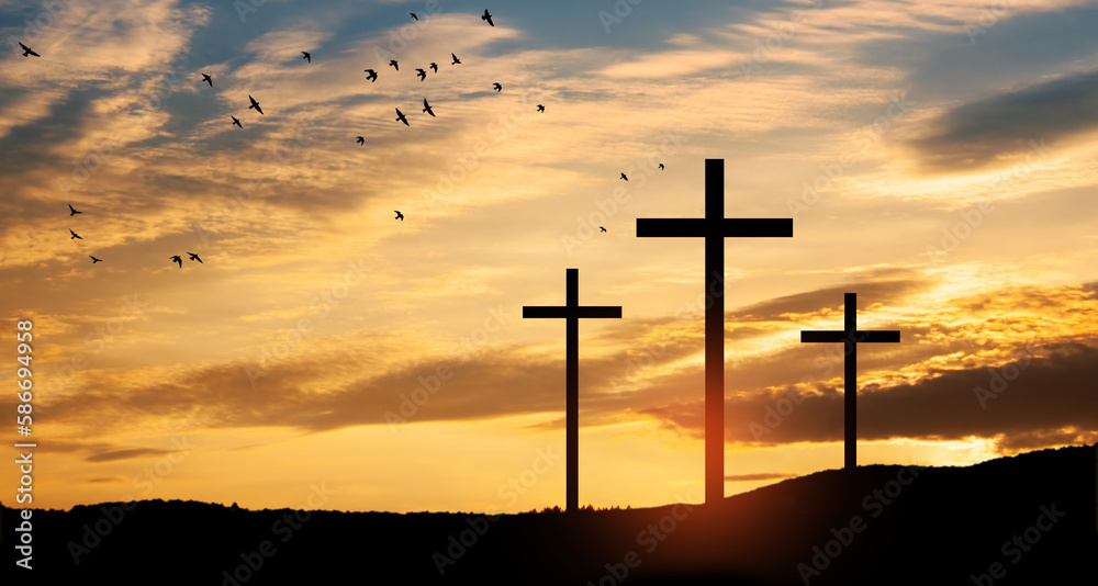 Christian crosses on hill outdoors at sunrise. Resurrection of Jesus.