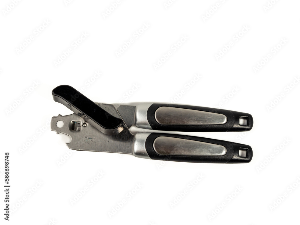 Obraz premium Can opener isolated on white background. Metal can opener. Close-up.