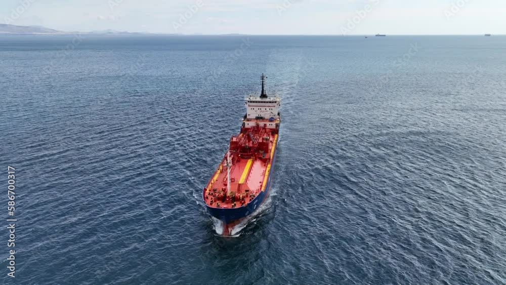 Aerial drone loop video of industrial liquified LPG gas tanker cruising deep blue Mediterranean sea Aerial drone loop video of industrial liquified LPG gas tanker cruising deep blue Mediterranean sea
