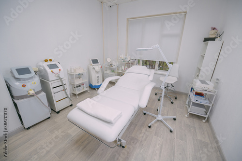 The interior of the massage and cometology salon, massage table. Nobody.