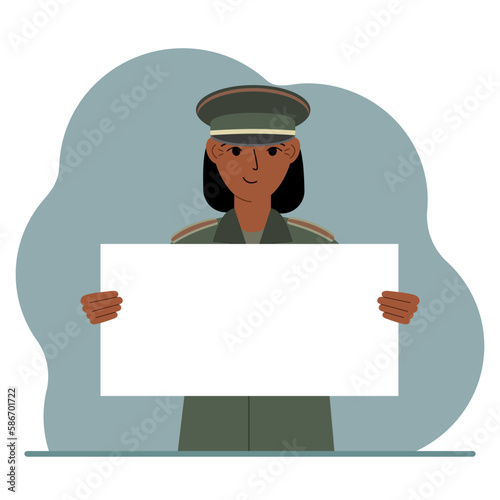 A military man in uniform holds a white sheet of paper in his hands. Concept for advertising, poster, banner.