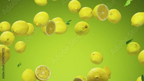 Fresh ryellow lemons falling down from top, Healthy fruits background texture pattern. Moving from top healthy lemon fruit background. photo