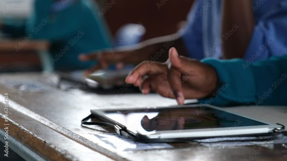 young african boys using tablets at school young african boys using tablets at school