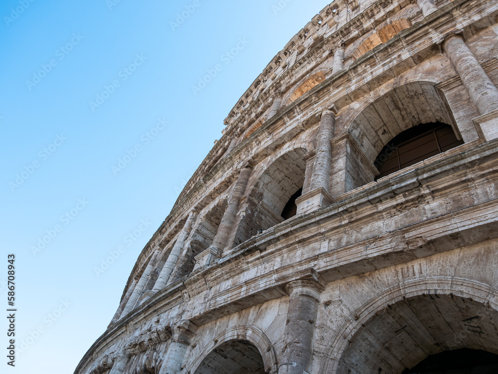 External view of the monumental three-story Colosseum in Rome. The Colosseum is the reference point for tourists visiting this wonderful city