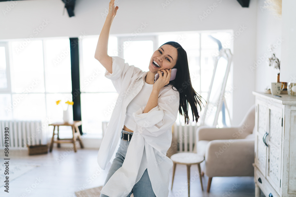 Joyful woman calling on smartphone Joyful woman calling on smartphone