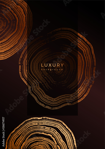 Luxury golden background with wood annual rings texture. Template with shiny tree ring pattern. Stamp of tree trunk in section. Natural wooden concentric circles. Black and bronze gold background
