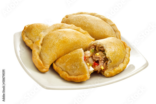 Deliciosas empanadas argentinas recheada de carne e ovo em fundo transparente - Saltenhas de carne photo