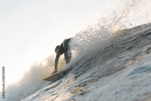 Surfer at sunset playa negra 