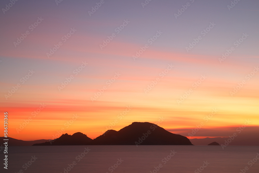 sunset on the beach. Seaside town of Turgutreis and spectacular sunsets. Selective Focus.  Long Exposure shoot. tranquility scene.