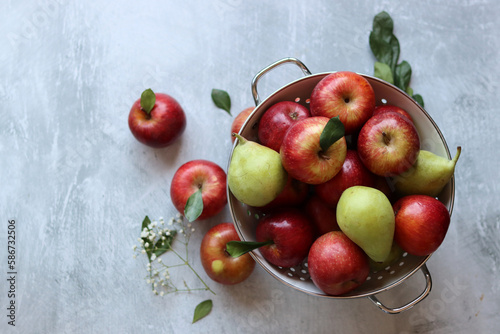 Beautiful shiny red apples on a table. Still life with organic fruit. Healthy eating concept. 