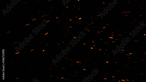 Burning ash background. Sparks backdrop. Flickering abstract Particles