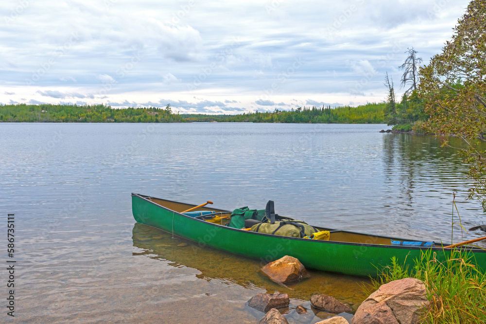 Canoe Ready on a Calm Lake
