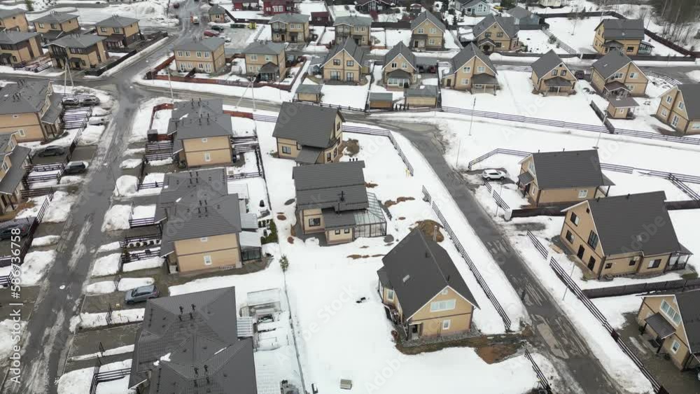 Country house shot from a quadcopter in winter Country house shot from a quadcopter in winter