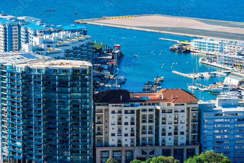 View of a marina in Gibraltar town and Bay of Gibraltar from The Upper Rock. UK