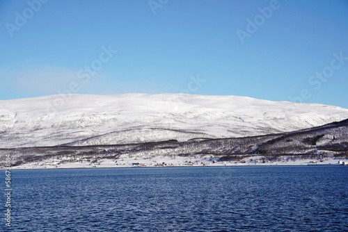 snowy landscape view in tromso fjords, norway © Hayriye
