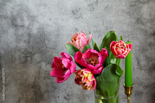 Obraz na płótnie Peony multicolored tulips on a concrete background. w salonie