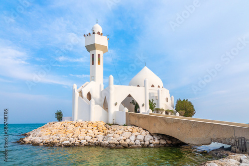 White Salem Bin Laden Mosque built on the island with sea in the background, Al Khobar, Saudi Arabia photo