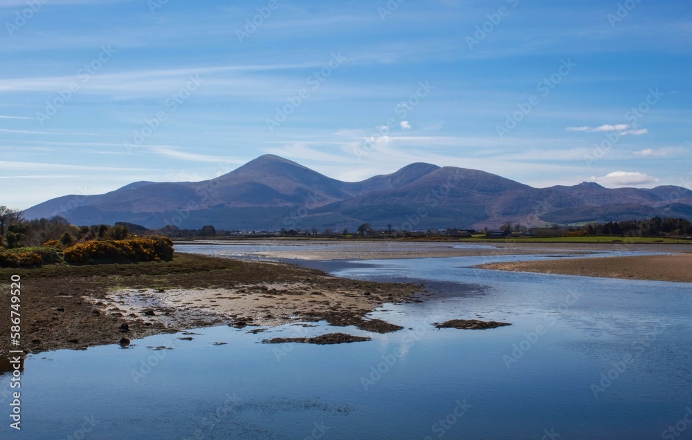 The Mourne Mountains in Northern Ireland taken from Dundrum Bay at low tide