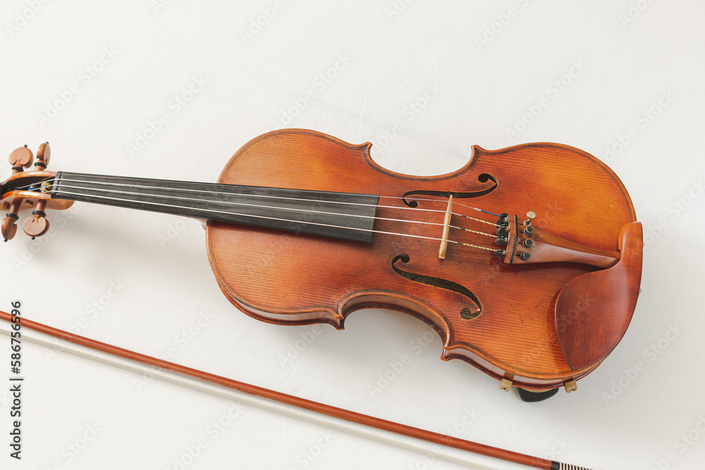 Beautiful Violin Closeup on White Background, Classical, Bluegrass, or Celtic Instrument with Detail Beautiful Violin Closeup on White Background, Classical, Bluegrass, or Celtic Instrument with Detail