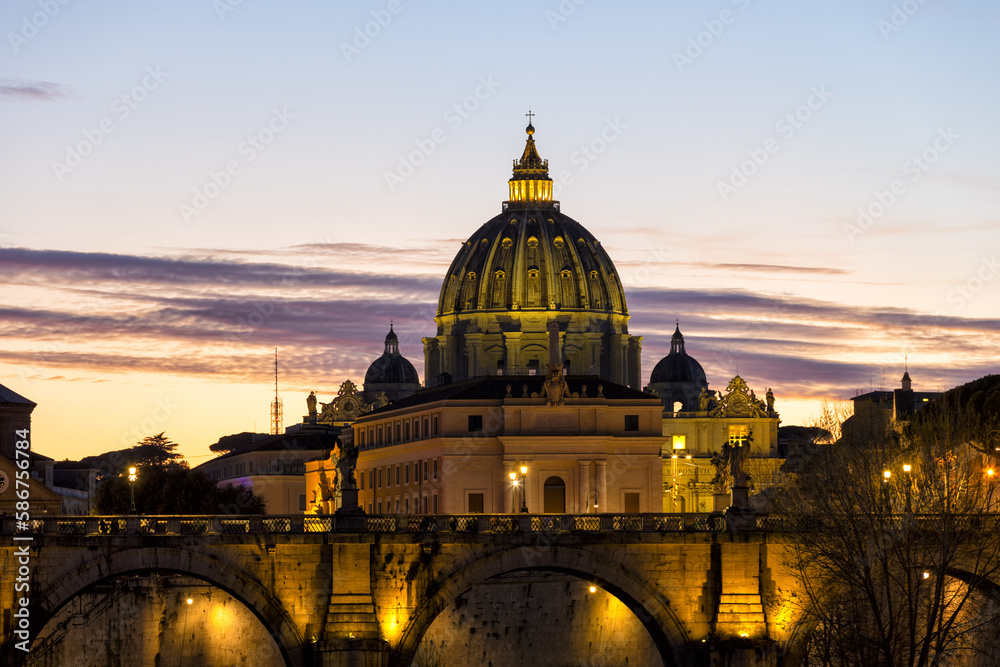 View of St. Peter's Basilica in the Vatican, the Pope's church, from Via della Conciliazione at night with lights. Vatican Rome Italy Europe. The most beautiful place in the world