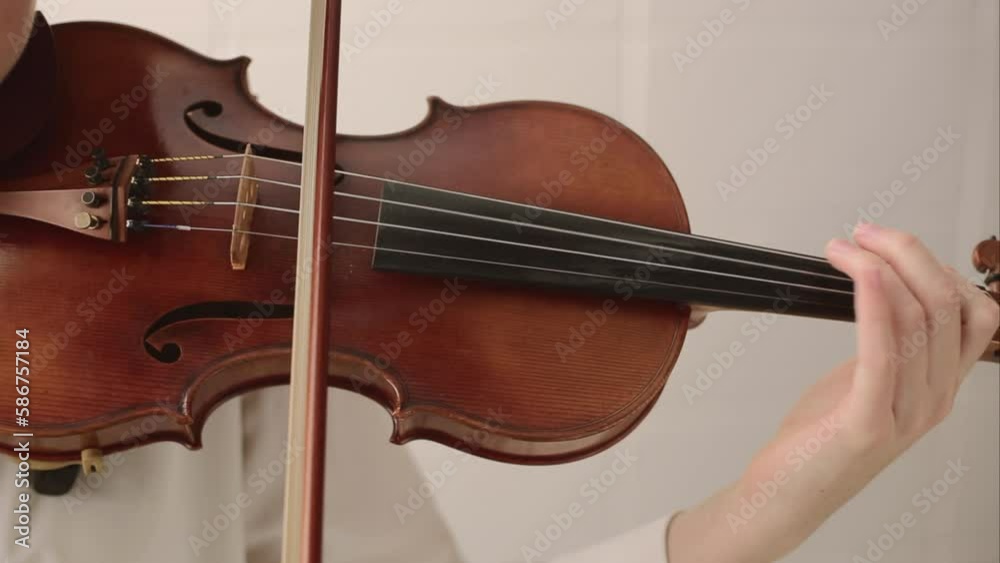 Hands Playing Beautiful Violin in Practice Time at Home, Classical, Bluegrass, or Celtic Instrument Hands Playing Beautiful Violin in Practice Time at Home, Classical, Bluegrass, or Celtic Instrument