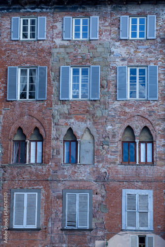 Exterior of typical Italian buildings. Lucca, Tuscany, Italy..