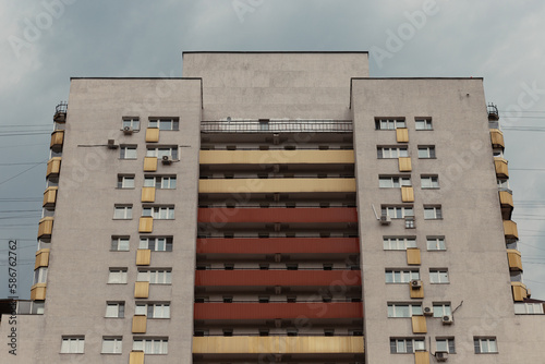 Close-up of the facade of a residential building, windows, balconies.