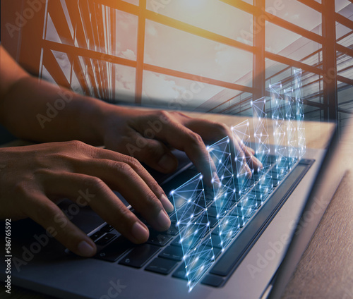 Abstract building and double exposure Businessman using the desktop laptop to plan strategic goals for industry growth, has virtual glow graph, market sector development concept, and team ideology.