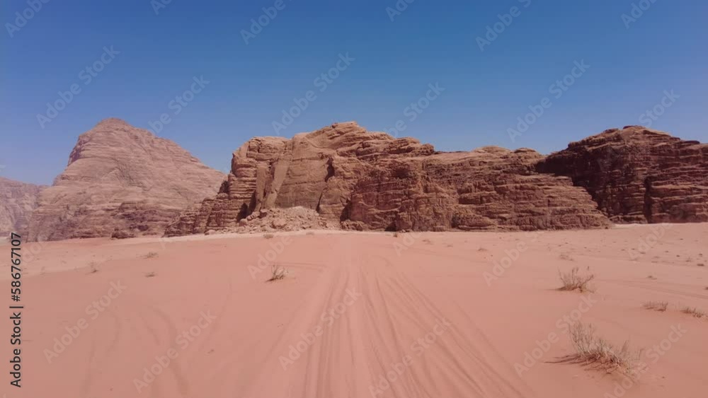Wadi Rum, Jordan: Point of view of a car that drives in the stunning desert of Wadi Rum in the middle east in Jordan. Wadi Rum, Jordan: Point of view of a car that drives in the stunning desert of Wadi Rum in the middle east in Jordan.